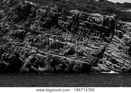 Mediterranean Sea. Crete. Greece. The cliffs of the peninsula of Kalydon. Black and white.