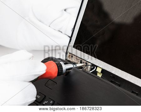 Serviceman In White Gloves Fixes Lcd Screen