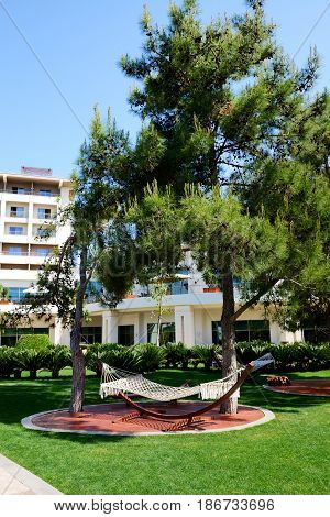 The hammock is on lawn in luxury hotel Antalya Turkey