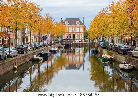 Canal With Autumn Colored Trees In Hoorn, Netherlands