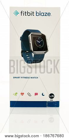Winneconne WI - 27 March 2017: A package containing a fitbit blaze on an isolated background.