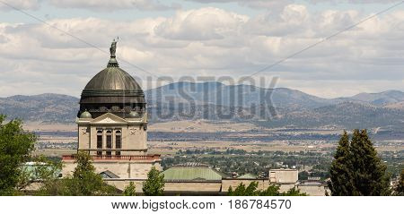 The sun hits the capital building in Helena late in the afternoon