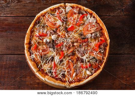 Italian junk food, bad habits, calories. Fresh baked sliced pizza served on wooden table, flat lay. Unhealthy lifestyle, voracity.