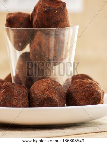 chocolate truffle close up on wooden table