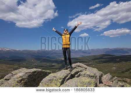 Woman Screaming On Top Of Mountain