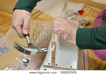 Hammering  Wooden Dowels
