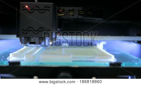 Three dimensional printing machine. 3D printer during work