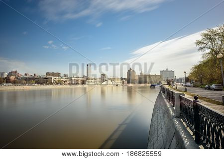 Krasnopresnenskaya embankment and Moskva-river as seen from the embankment of Taras Shevchenko. Moscow, Russia.