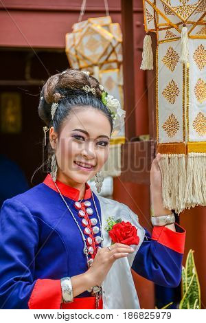 NAKORN PHANOM THAILAND - FEBRUARY 14 2015: Thai northeastern Phutai dancer with traditional costume in Phutai world event day in Renunakorn of Nakorn Phanom Thailand.