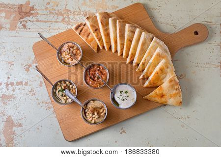 Set Of Appetizers: Hummus, Muhammara, Tirokafteri, Greek Cacik