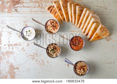 Set Of Appetizers: Hummus, Muhammara, Tirokafteri, Greek Cacik