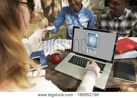 Woman working on laptop network graphic overlay