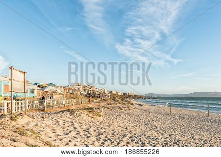LANGEBAAN SOUTH AFRICA - APRIL 1 2017: Sunset at a beach at Mykonos in Langebaan a town on the Atlantic Coast of the Western Cape Province