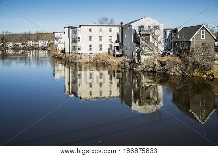 Houses on the Saco River. The river adjoining the two towns of Biddeford and Saco in Maine USA