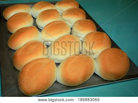 Pandesal freshly baked from the oven
Pandesal or bread of salt is a popular bread bun in the Philippines usually dipped in hot coffee or stuffed with corned beef, fried egg or other fillings.