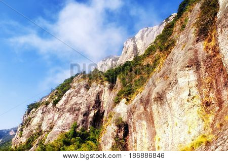 Early morning clouds hanging over Yandangshan or Yandang mountains in China in Zhejiang province.