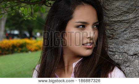 A Close Up of a Serious Teen Girl