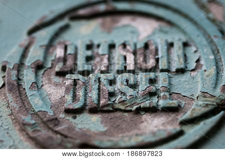 Detail of the engine cover of an abandoned crane stating the place of manufacture