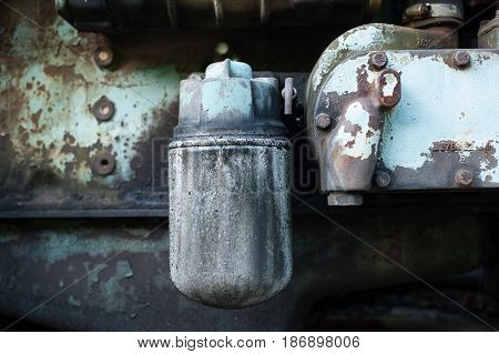 Detail of the diesel engine of an abandoned crane