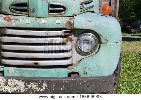 HOT SPRINGS VIRGINIA- MAY 8 2017: Old pick up truck abandoned by the side of the road.