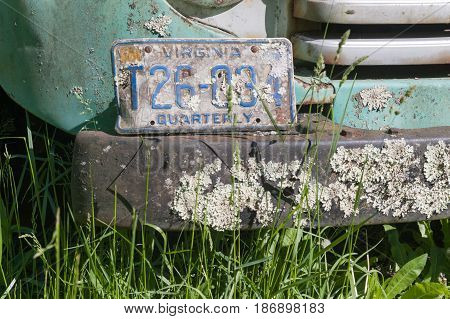 HOT SPRINGS VIRGINIA- MAY 8 2017: Old pick up truck abandoned by the side of the road.