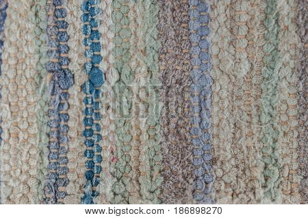 Detail of the fabrilc of an old pillow
