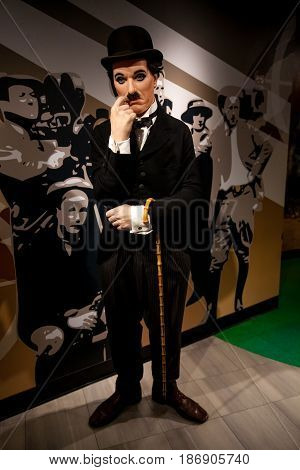Amsterdam, Netherlands - March, 2017: Wax figure of Sir Charles Spencer Charlie Chaplin, English comic actor in Madame Tussauds Wax museum in Amsterdam, Netherlands