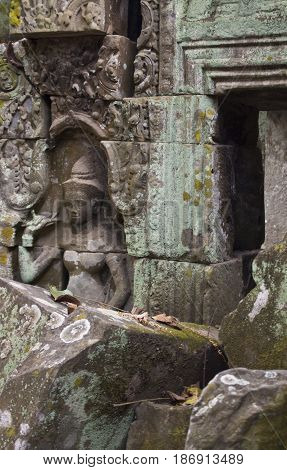 Scuplture detail in Ta Prohm Temple Cambodia.