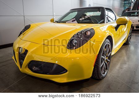 STUTTGART GERMANY - MARCH 03 2017: Sports car Alfa Romeo 4C Spider (Type 960) 2015. Europe's greatest classic car exhibition 