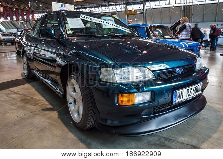 STUTTGART GERMANY - MARCH 03 2017: Rally special car Ford Escort RS Cosworth 1993. Europe's greatest classic car exhibition 