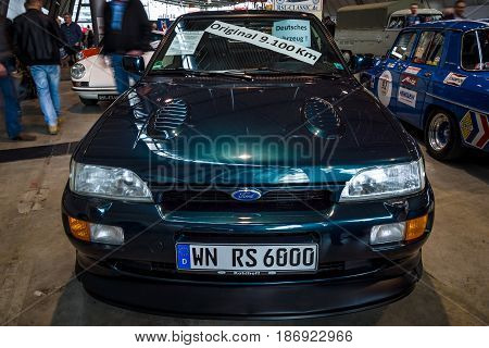STUTTGART GERMANY - MARCH 03 2017: Rally special car Ford Escort RS Cosworth 1993. Europe's greatest classic car exhibition 