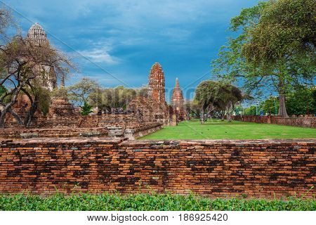 Ruins Of Buddha Statues And Pagoda Of Wat Ratcha Burana In Ayutthaya Historical Park, Thailand