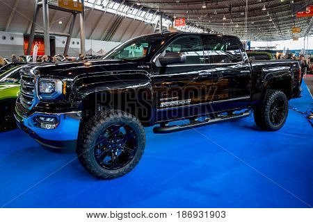 STUTTGART GERMANY - MARCH 03 2017: Heavy-Duty pickup truck GMC Sierra 1500 Crew Cab SLT 2017. Europe's greatest classic car exhibition 