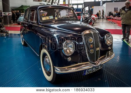 STUTTGART GERMANY - MARCH 03 2017: The small family car Lancia Appia Berlina first series 1954. Europe's greatest classic car exhibition 