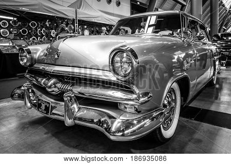 STUTTGART GERMANY - MARCH 03 2017: Mid-size luxury car Ford Mainline 1953. Black and white. Europe's greatest classic car exhibition 