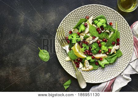 Vegetable Green Salad With Chicken And Pomegranate.top View With Copy Space.