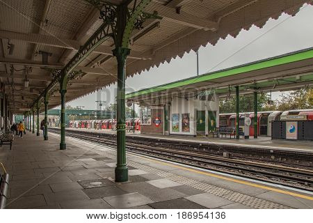 Hainault Ilford Essex UK - November 1 2017: Platform view of an outdoor underground station at Hainault Essex.