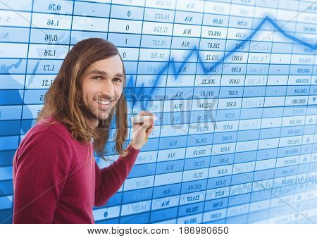 Digital composite of Man with pen against blue graph