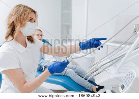 Let us try this one. Wonderful experienced scrupulous doctor choosing which device better employing for the procedure she running