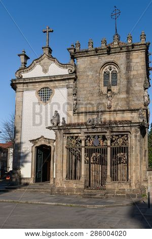 Braga, Portugal - Circa February 2019: Sao Joao Do Souto Church (left) And Coimbras Chapel (right). 