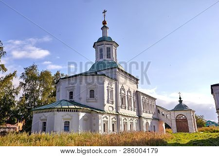 Old Orthodox Church At Village. Summer View With Floral Meadow.
