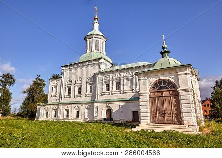 Old Orthodox Church At Village. Summer View With Floral Meadow.