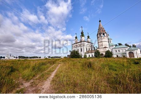 Old Orthodox Church At Village. Summer View With Floral Meadow.