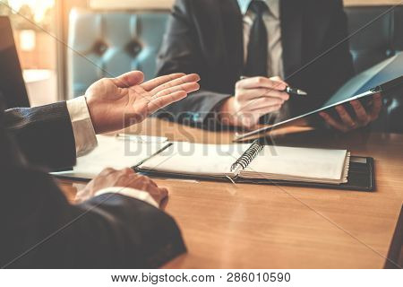 Job Interview Concept , Senior Manager Reading A Resume During A Job Interview Employee Young Man Me