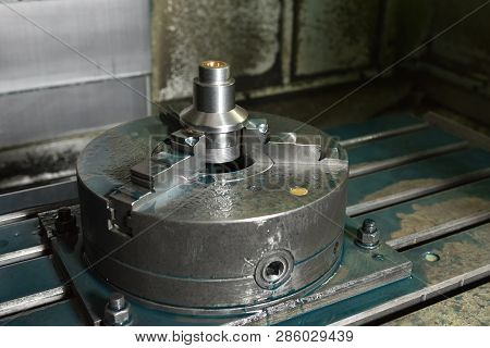 Spindle Chuck And Installed Metal Part On High Precision Cnc Industrial Lathe Turning Machine. Close