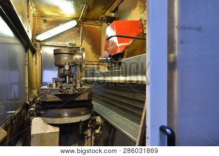 The Cnc Machine Is Preparing To Check The Dimensions Of The Part With A Special Contact Sensor.