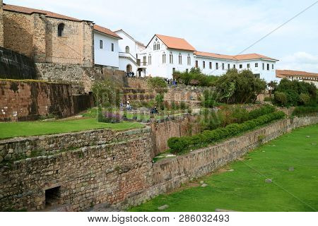 People Resting In The Garden At Convent Of Santo Domingo That Built Over Former Temple Of The Sun Of