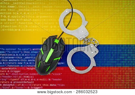 Colombia Flag  And Handcuffed Computer Mouse. Combating Computer Crime, Hackers And Piracy