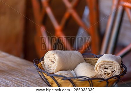 Rolls Of Injera In A Serving Bowl.  Injera Is A Sourdough Flatbread Made From Teff Flour.  It Is The