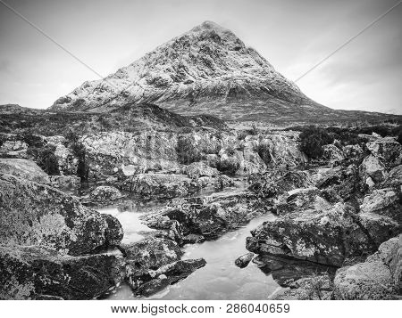 Pools And Majestatic Waterfalls Belllow Snowy Mountains. Blue Water Mirrorong Blue Cloudy Sky